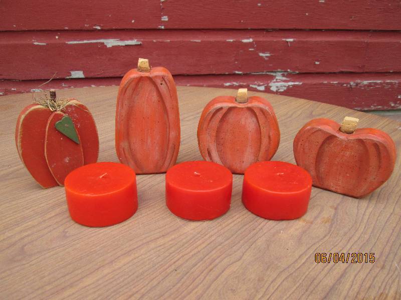 Set of wooden pumpkins with orange ...