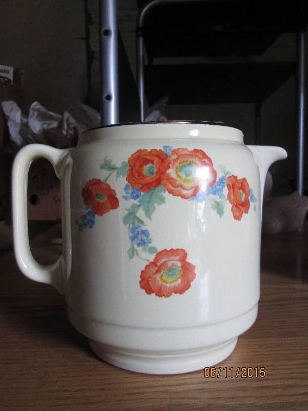 Halls porcelain tea pot with orang...
