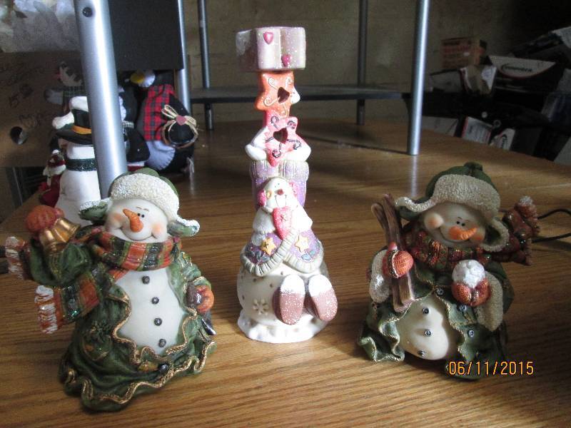 Trio of resin snowment table top de...
