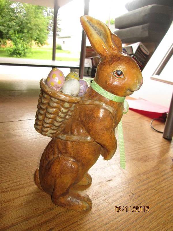 Easter Bunny with basket of eggs ta...