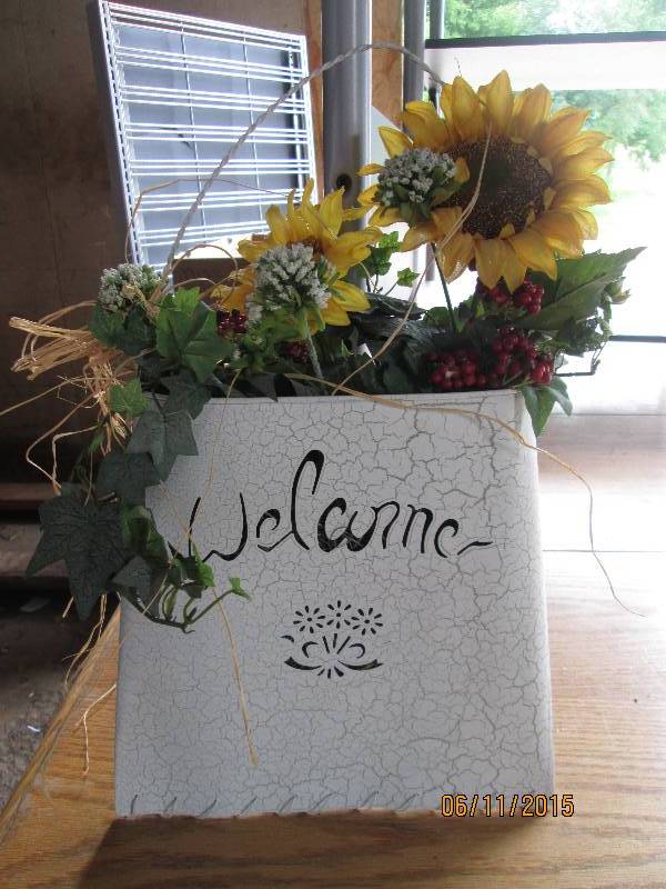 Hanging tin basket with fall flower...