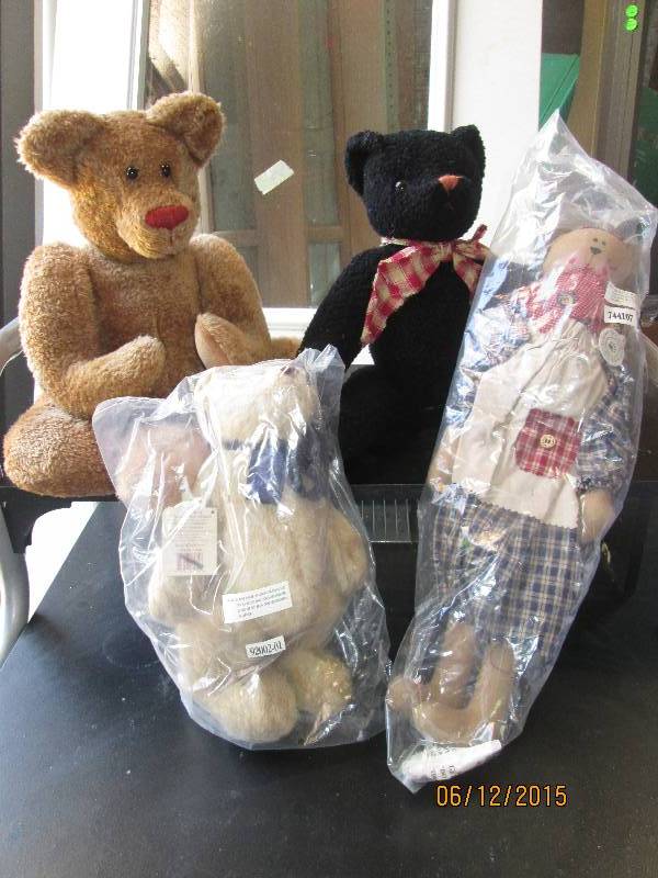 Lot of 4 bears with movable joints....