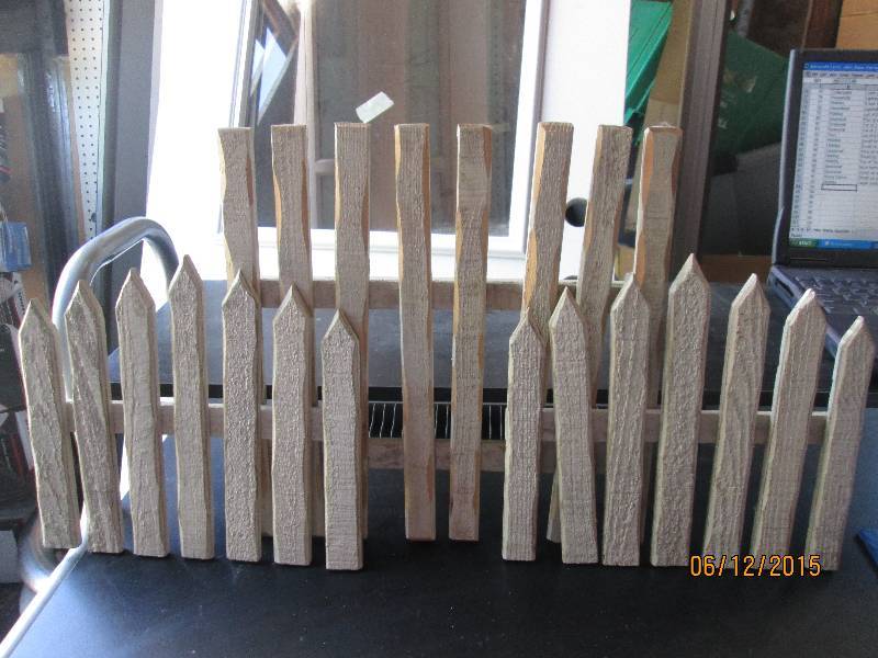 Lot of small white fencing ...