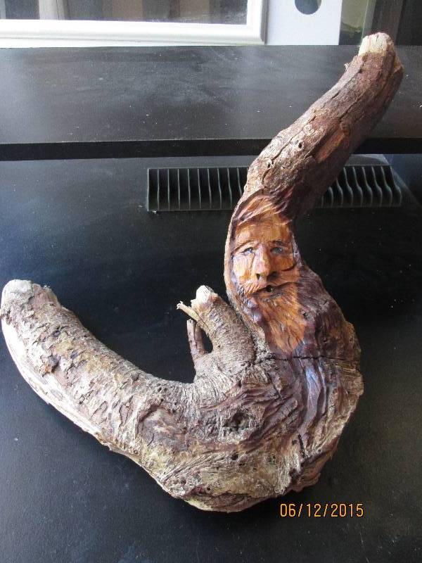 Interesting carving of a mans face...