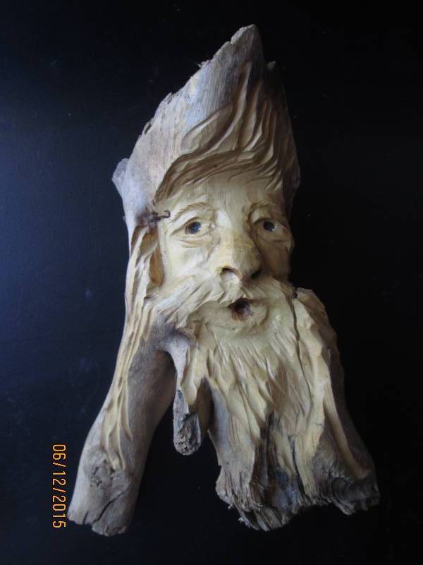 Interesting carving of a mans face...