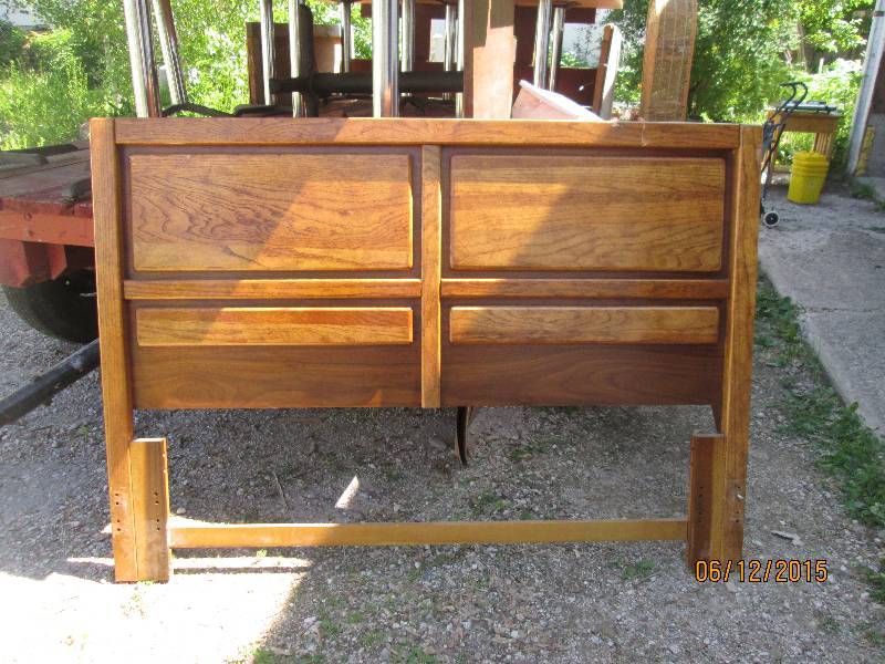 Nice solid wood headboard. Measures...