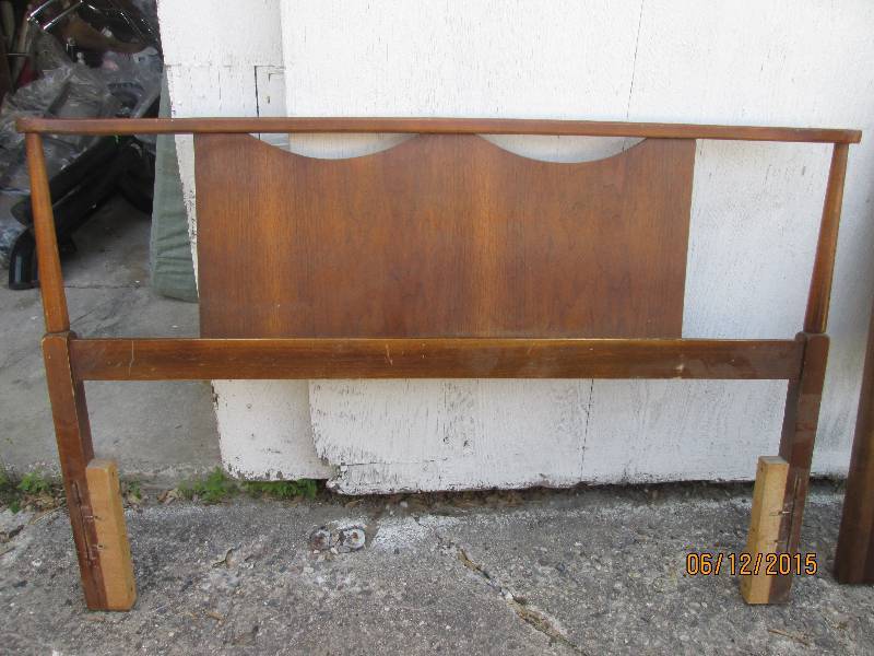 Nice solid wood headboard. Measures...