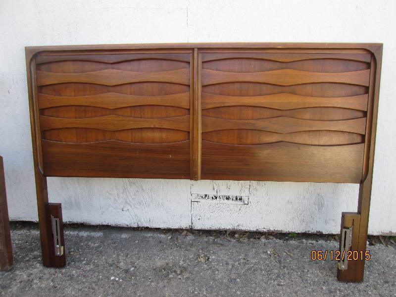 Nice solid wood headboard. Measures...