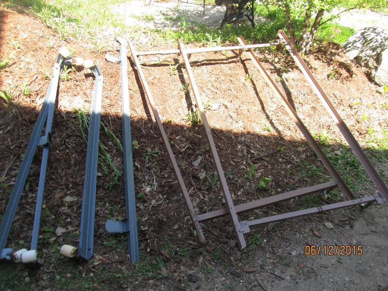 Pair of twin size bed frames and ad...