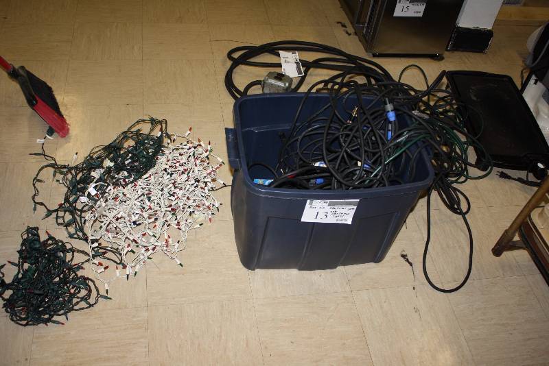lot 13 image: Box Lot of Miscellaneous Electrical Cords Includes Bin & Christmas Decorations.