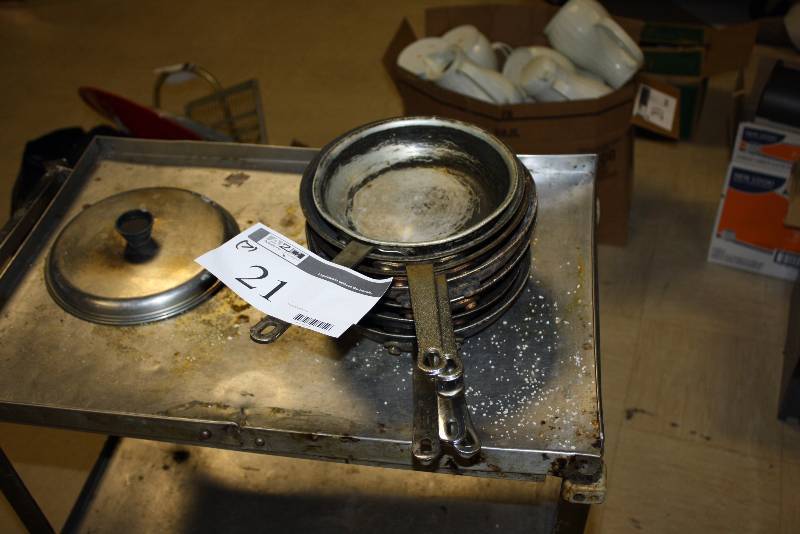lot 21 image: Lot of (7) Metal Commercial Frying Pans Miscellaneous Sizes.