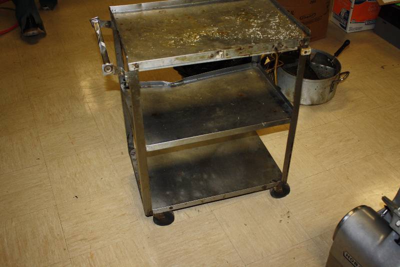 lot 23 image: Stainless Steel Metal Cart w3 Shelves & Wheels Pan Not Included 16 x 27 x 32.