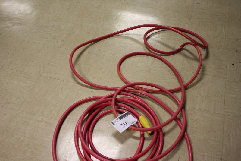 lot 29 image: Red Hose wThreaded Ends For Attachments.