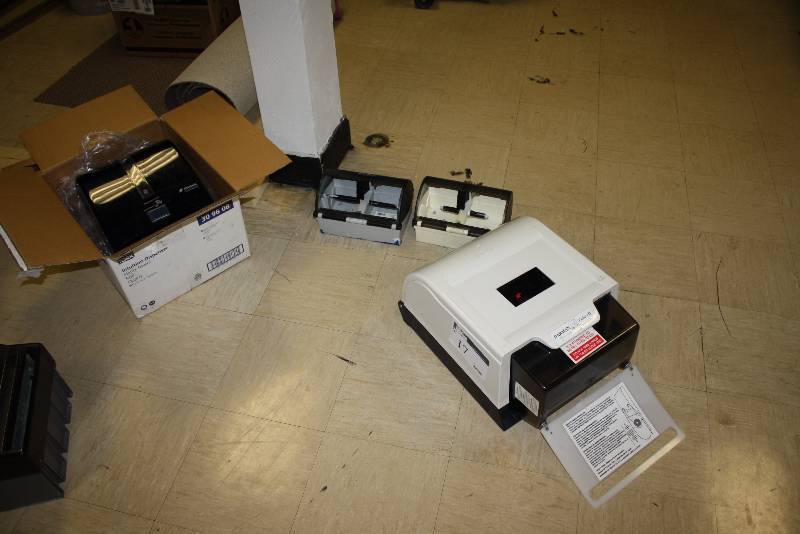 lot 17 image: Lot of (4) including Paper Towel Dispensers Tork Intuitive Paper Towel Dispenser Commercial Toilet Paper Dispensers (2).