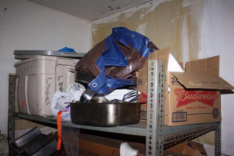 lot 70 image: Shelf Lot Including Plastic Tub Metal Mixing Blades Tarp Electric Fan And More.