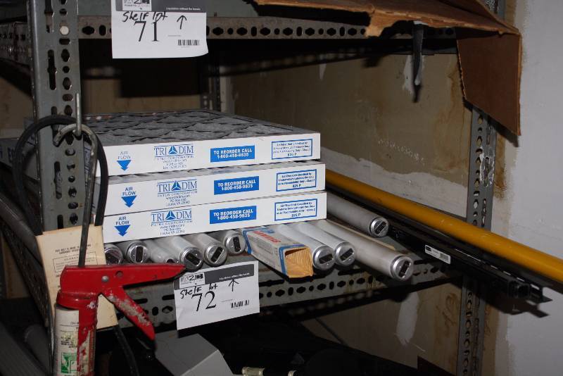 lot 72 image: Shelf Lot Including Fluorescent Light Bulb Tubes Triadim Airflow Filters Caulking Gun And More.