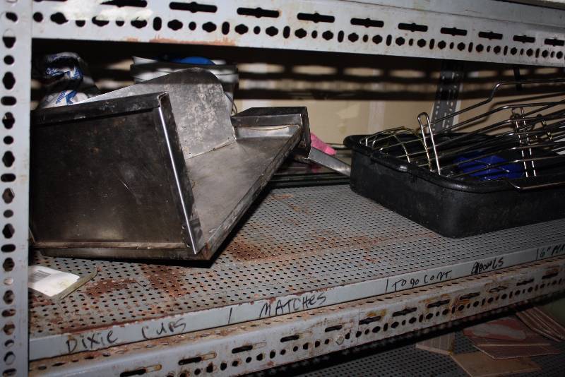 lot 69 image: Shelf Lot Including Toaster wCord, Stainless Steel Metal Pans Metal Grate And More.