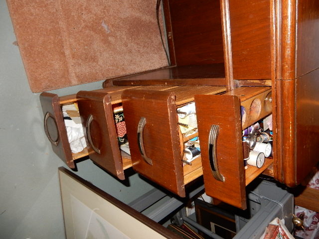 White Sewing Machine in Cabinet