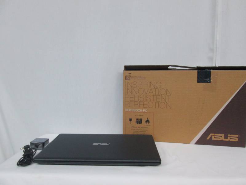 lot 19 image: ASUS 15.6 4GB Windows 8.1 Laptop