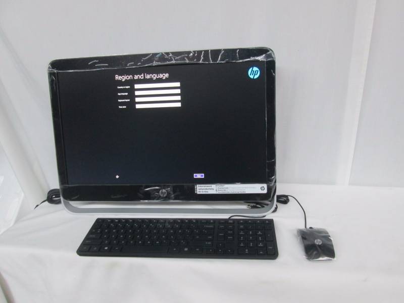 lot 3 image: HP Pavilion AIO 4GB Desktop w 23 Full HD Display