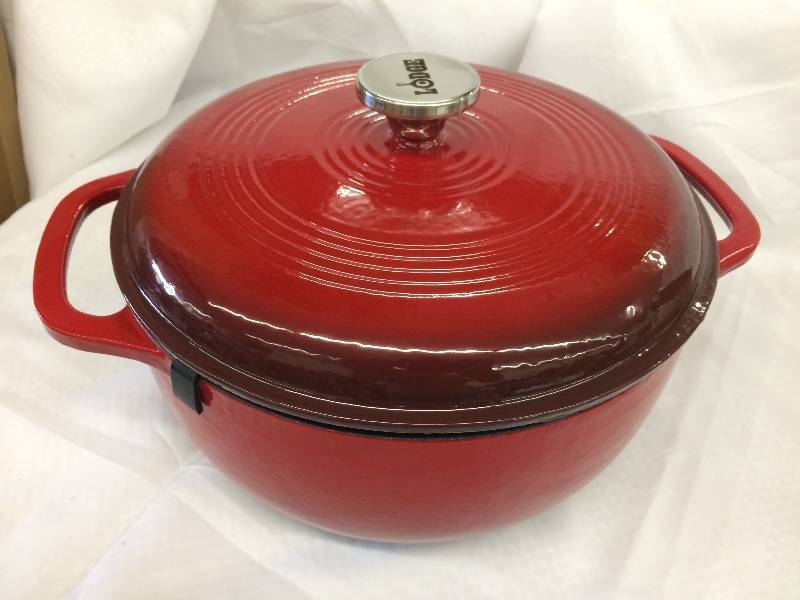 lot 72 image: Lodge enamel  6Qt. Cast Iron Covered Casserole Pot  retails for $79 at target
