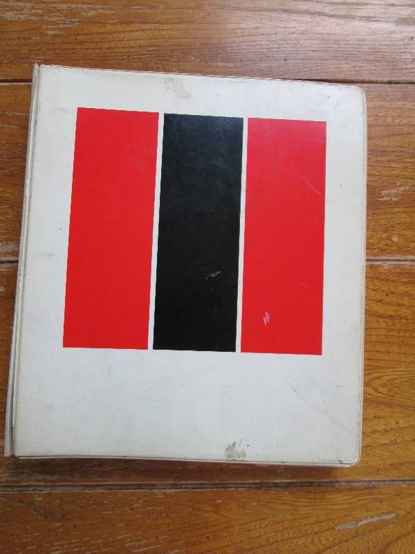binder full of sports cards- basket...