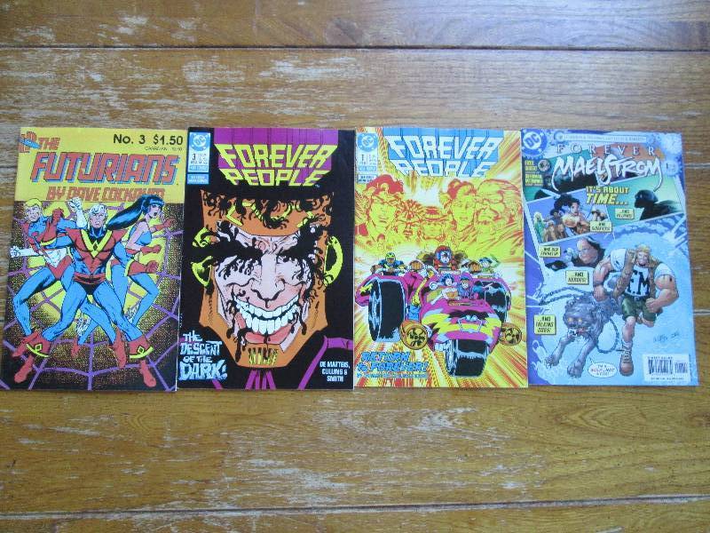 lot of 4 comic books- forever peopl...