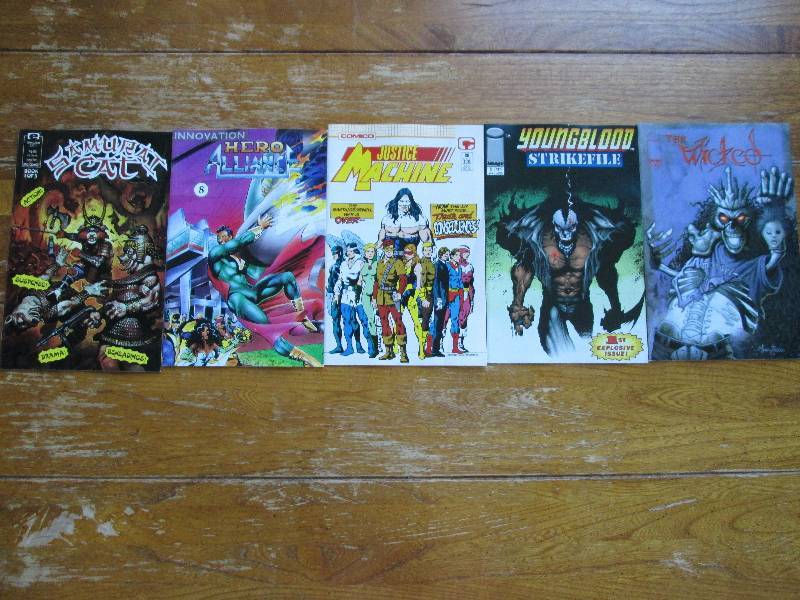mixed lot of 5 comix books- justice...