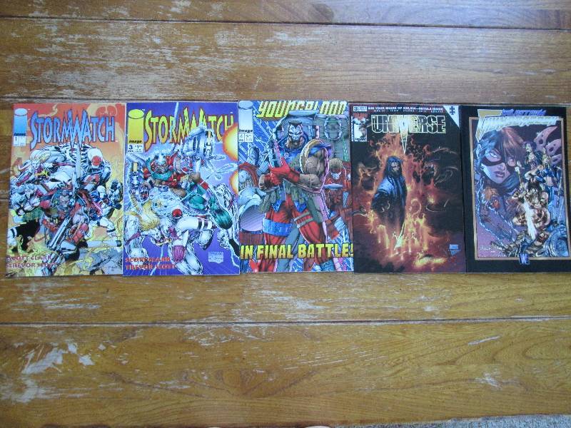 lot of 5 comic books- storm watch, ...