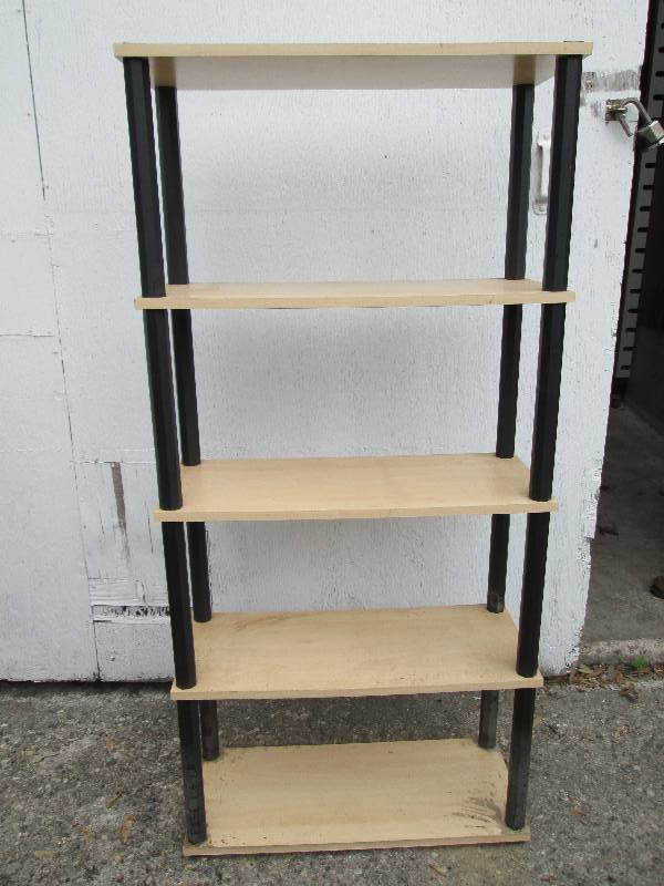 Shelf with wood tone shelves, and p...