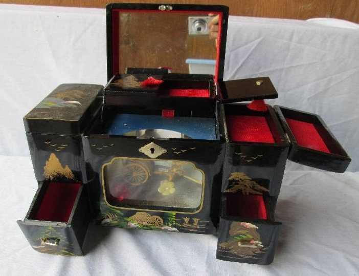Musical jewelry box, plays as the w...