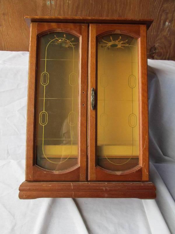 Jewelry box with necklace hangers...