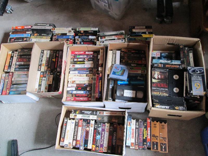 7 Boxes plus more VHS tapes, see al...