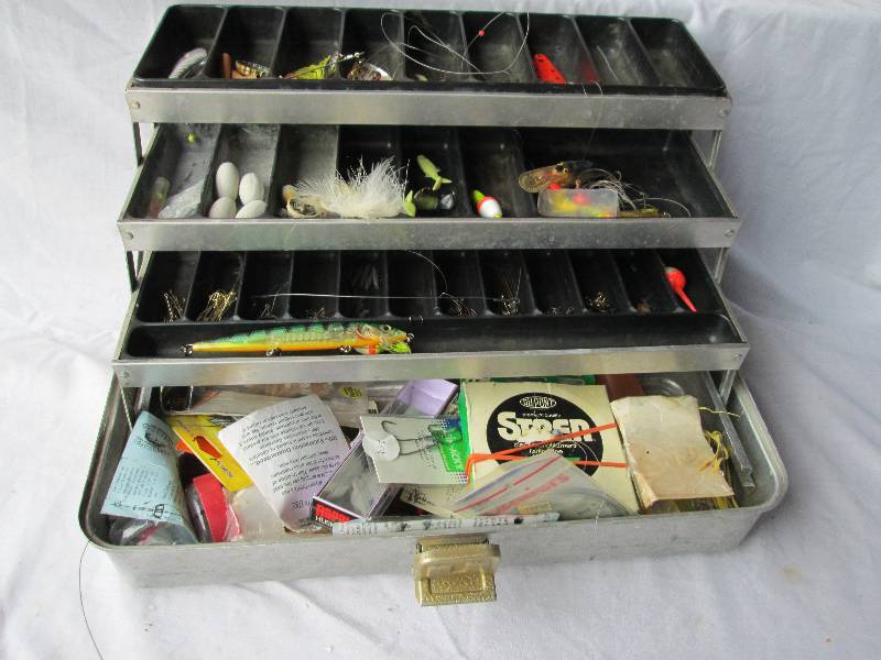 Fishing tackle box filled with tack...