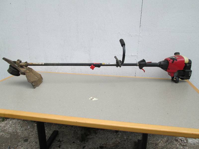 Troy Built gas power trimmer, brush...