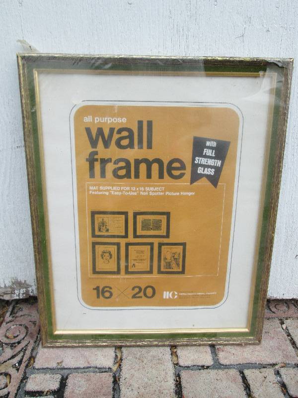 Wall frame, new in the shrink wrap...