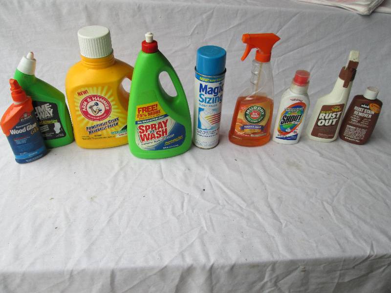 Lot of partial bottles of household...