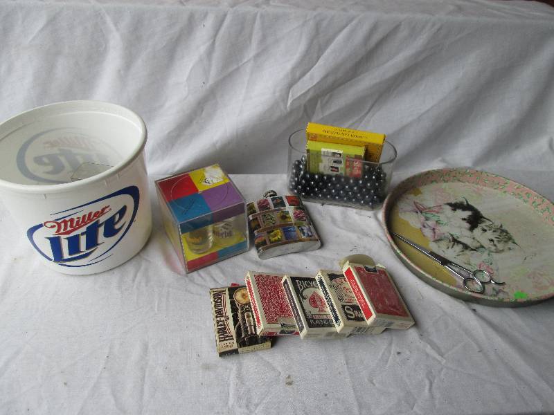 Playing cards, dcor and drink sup...