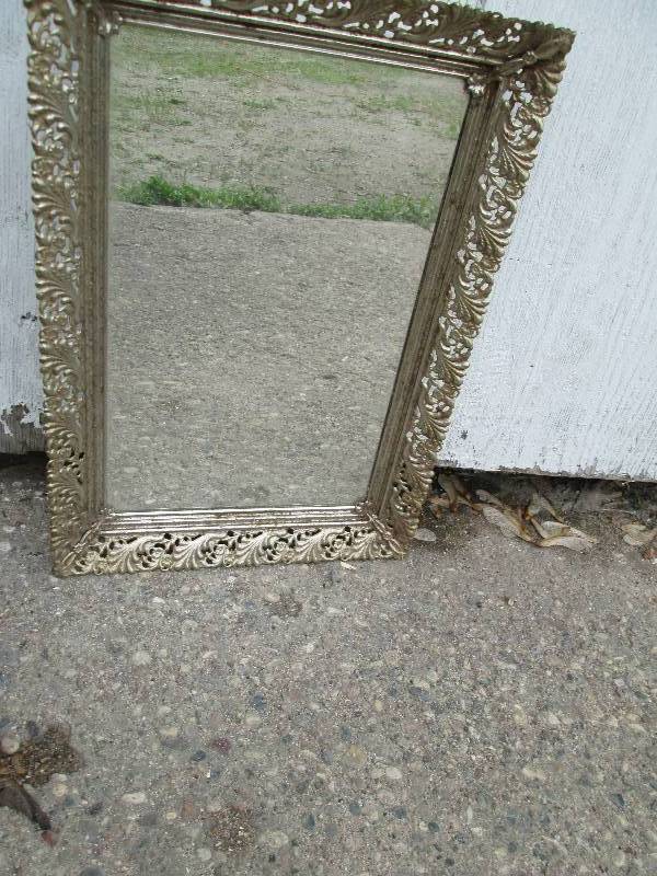 Mirror with nice patterned frame, m...