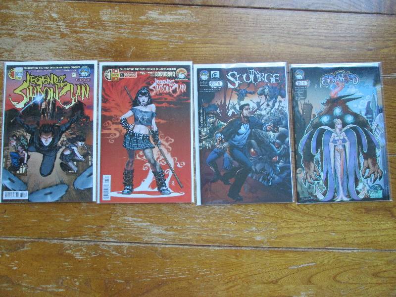 lot of 4 comic books- legend of the...