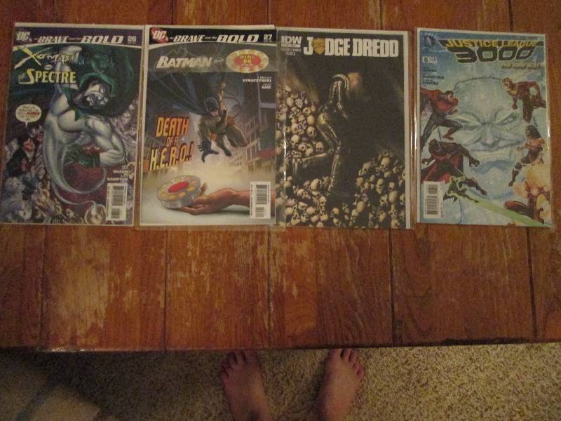 lot of 4 comic books- xombi and the...
