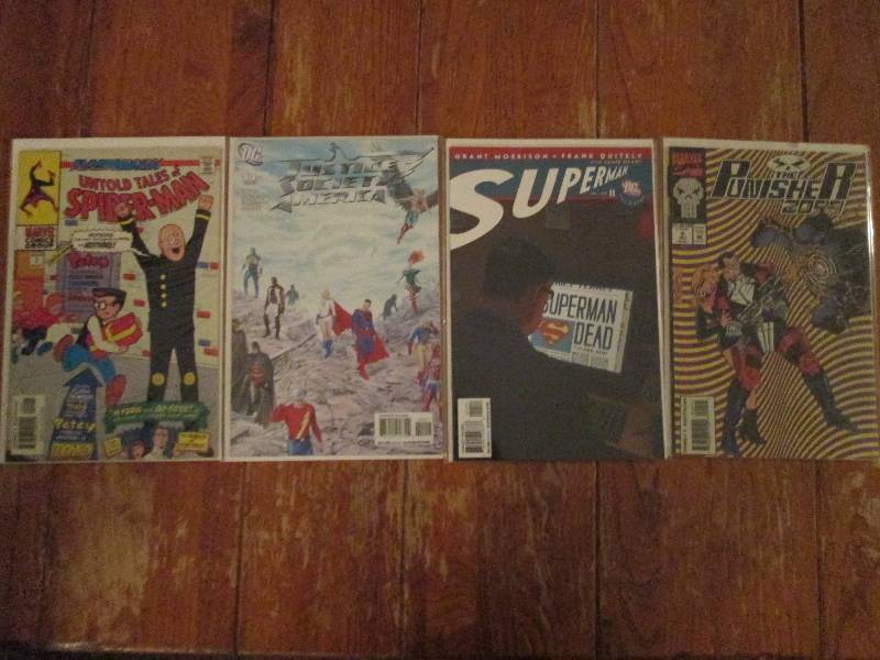 mixed lot of 4 comic books- justice...