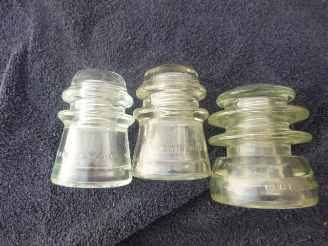 lot 19 image: 3 Glass Insulators