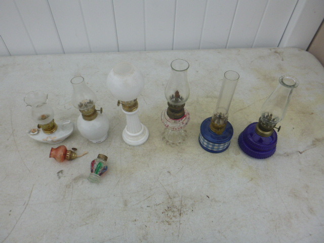 lot 69 image: 7 Small Oil Lamps