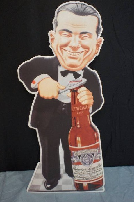 lot 77 image: Budweiser Smilin Charlie Tin Sign
