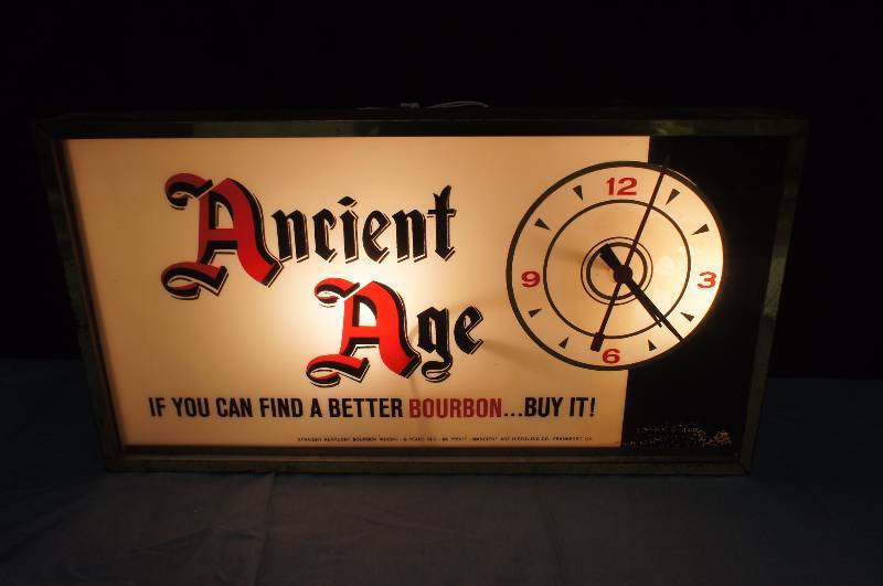 lot 89 image: Vintage Ancient Age Bourbon Lighted Clock