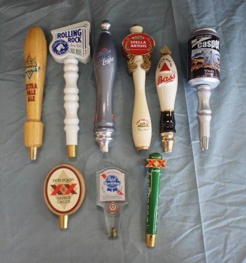 lot 36 image: Nine Assorted Tap KnobsHandles