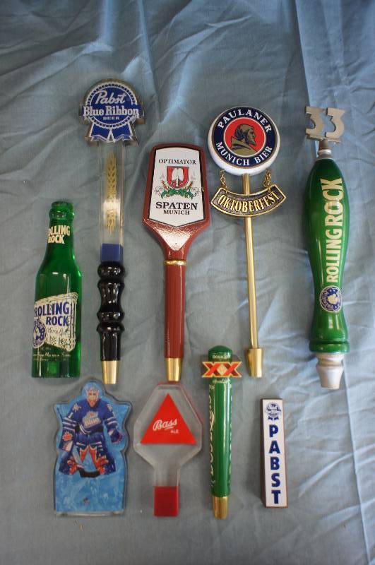 lot 37 image: Nine Assorted Tap KnobsHandles