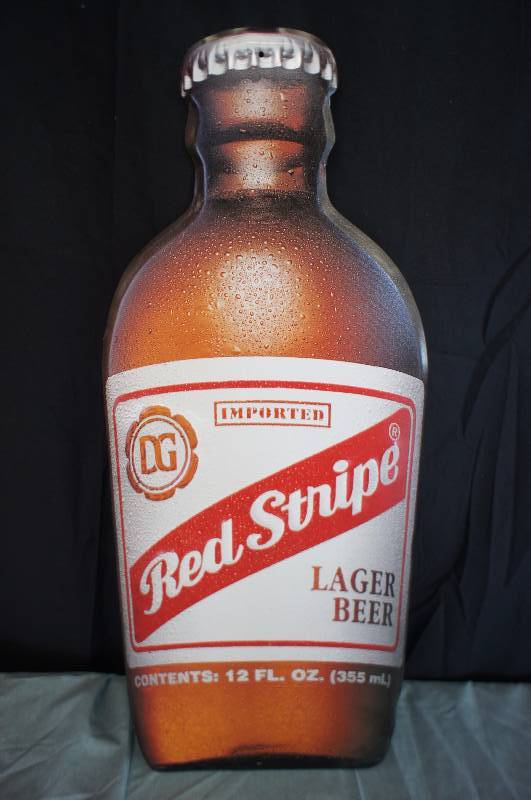 lot 55 image: Red Stripe Lager Embossed Tin Sign