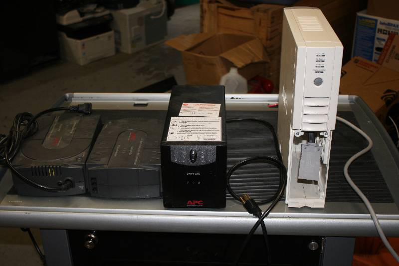 lot 58 image: Lot of (4) Battery Back-Ups Including APC Back-UPS ES 350 (2) Miscellaneous Backups (2) 3 Of 4 Powers On.